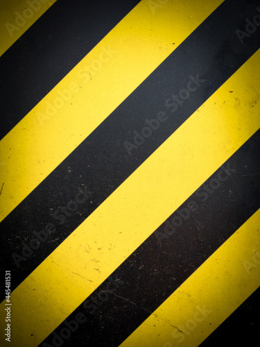 yellow black striped hazard warning background © PT88