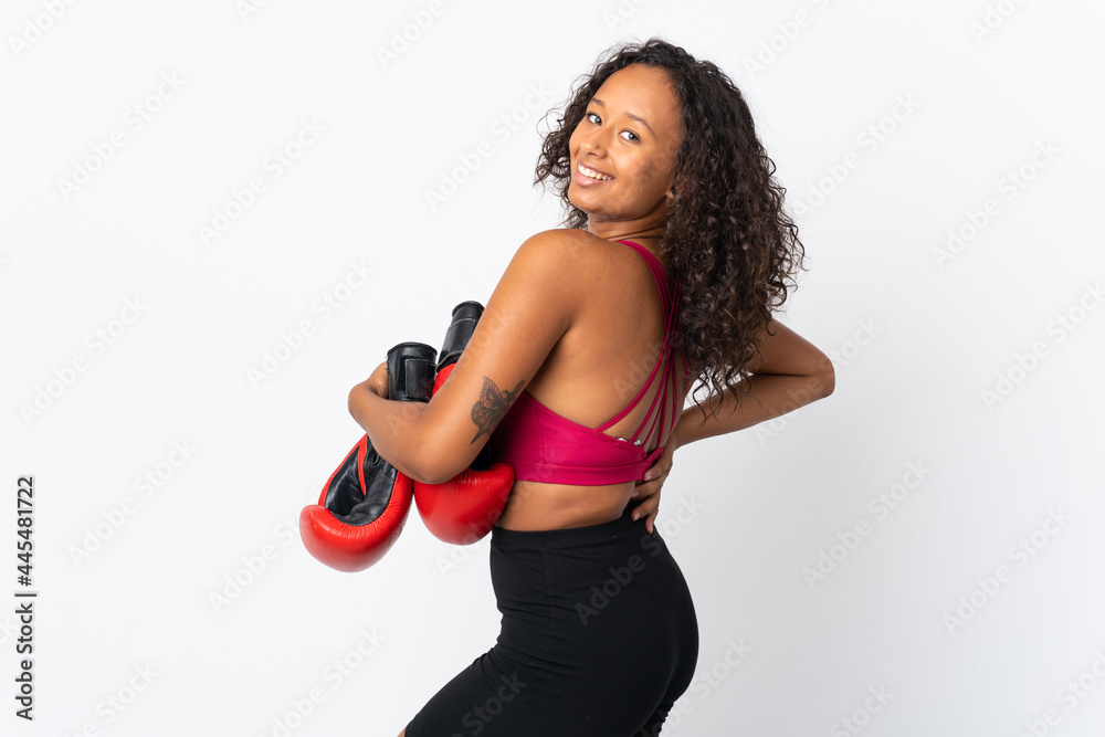 Teenager cuban girl isolated on white background with boxing gloves