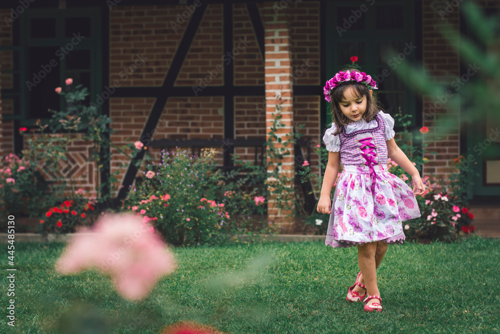 Fototapeta premium girl dressed in German in the garden
