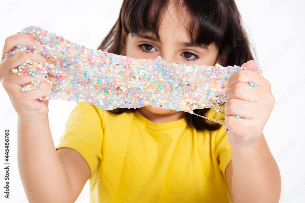 girl in yellow with slime on white background. girl in yellow with slime on white background.