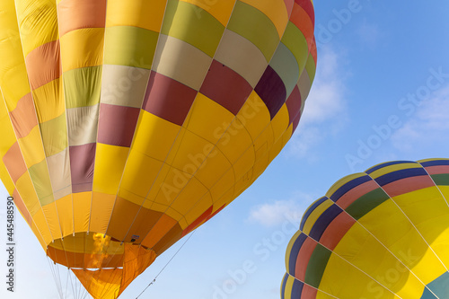 Colorful hot air balloons over blue sky in California