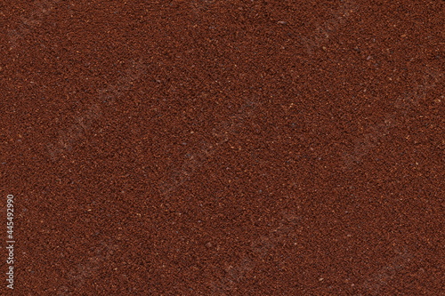 Ground coffee surface. The texture of the ground coffee. 