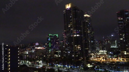 Wallpaper Mural Night Time view of a Plane Landing over San Diego California with the City Light Blinking and Shining in the Background Torontodigital.ca