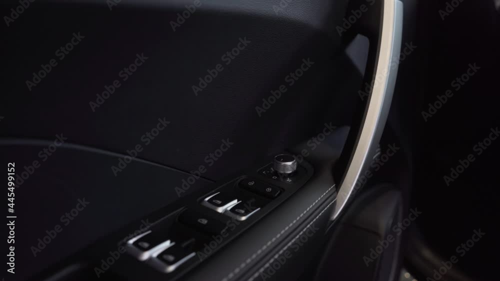 Panel with a buttons electric drive of glass on the armrest car. Panel with a buttons electric drive of glass on the armrest car.