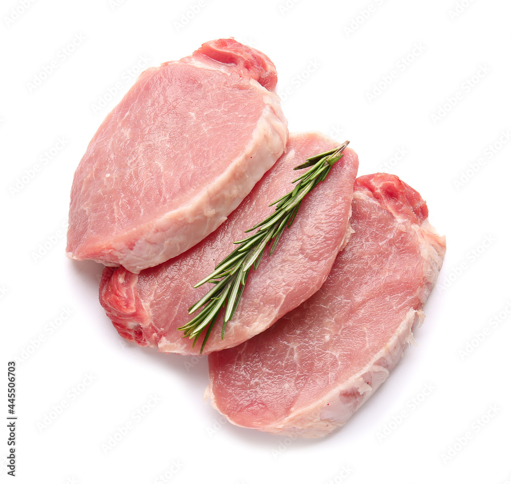 Slices of raw pork meat and rosemary on white background