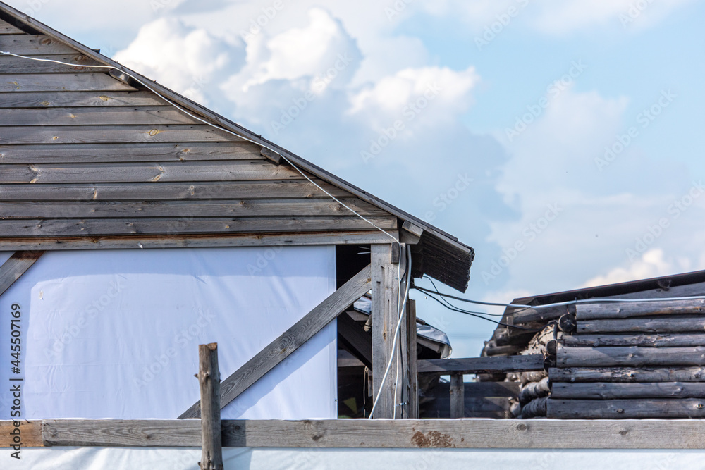 The roof of a wooden house