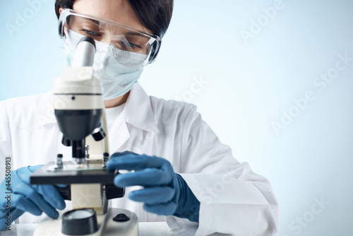 please white coat microscope science research closeup laboratory