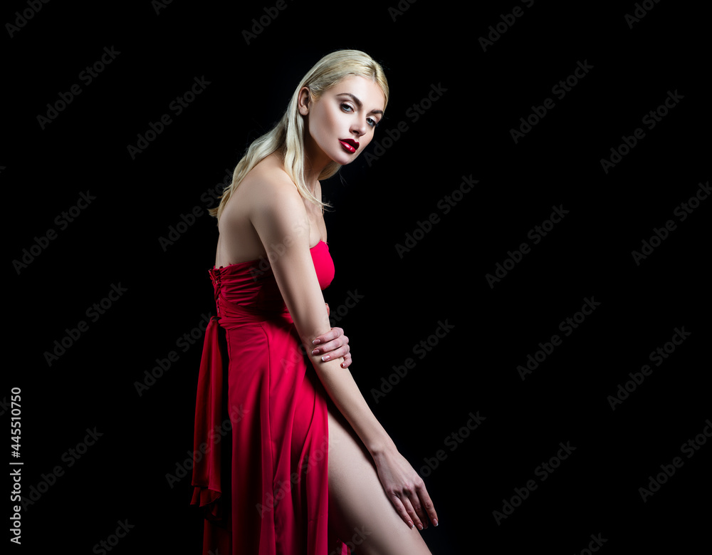 Red dress. Sensual portrait of young woman. Beautiful girl fashion model. Elegant Lady. Red dress. Sensual portrait of young woman. Beautiful girl fashion model. Elegant Lady.