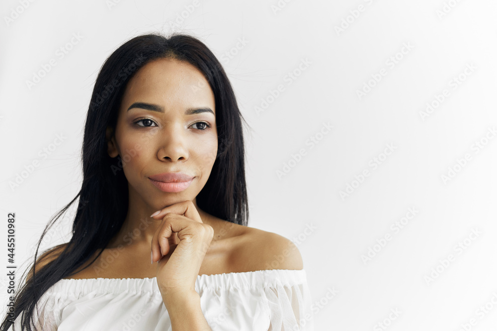 pretty woman african appearance white dress basing light background pretty woman african appearance white dress basing light background