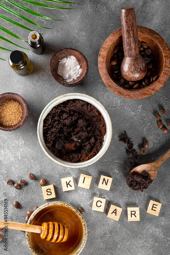 Ingredients for making homemade coffee skincare scrub on gray background. Eco friendly cosmetics, vertical photo © Kseniya