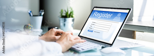 Businesswoman s Hand Filing Online Registration Form