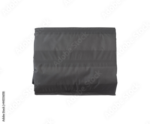 Rolled up self inflating sleeping mat for camping isolated on white background