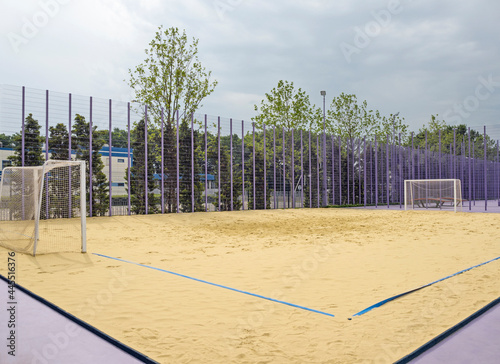 Playing field with sand and goalposts for beach soccer