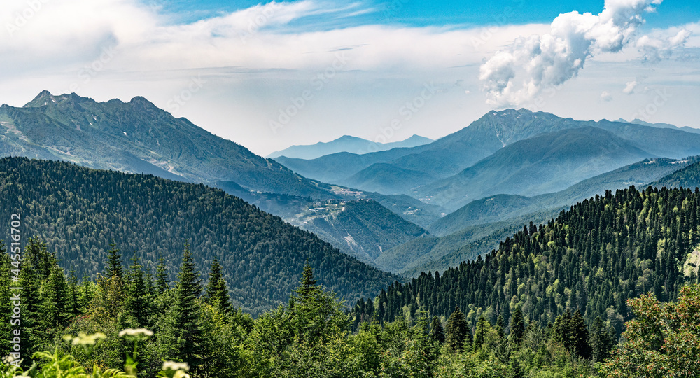 Panoramic view of Krasnaya Polyana with Rosa Khutor resort and mountain ridge