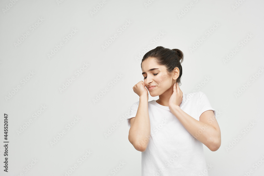 woman holding neck joint pain health problems woman holding neck joint pain health problems
