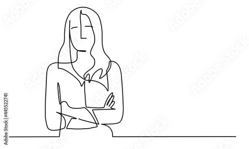 Confident woman with crossed arms.