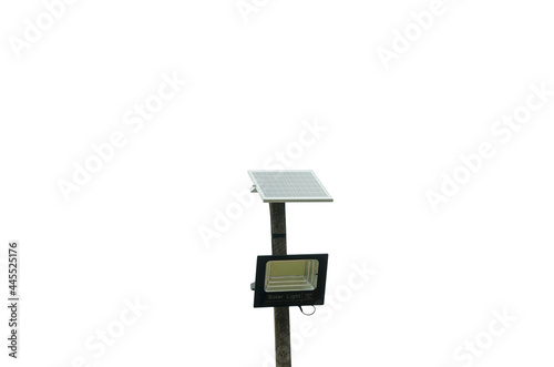 Close up of a solar powered street light isolated on white background.