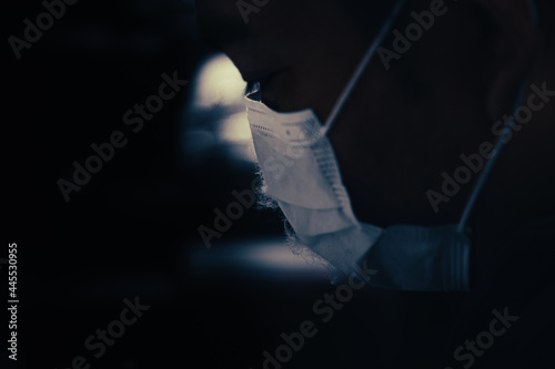 Man wearing hygienic mask to prevent infection.Protection against contagious disease,coronavirus, covid-19.