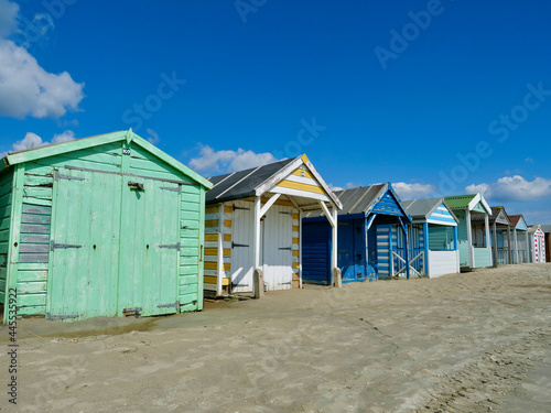 Traditional british beach huts on the West wittering beach, England, UK.