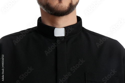 Priest wearing cassock with clerical collar on white background, closeup photo