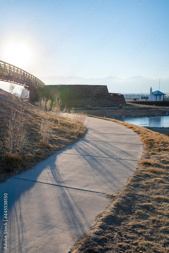 Blind curved path in the middle of the hill with grass against the ...