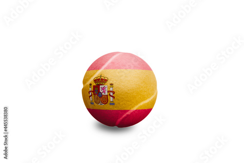Tennis ball with the colored national flag of Spain on the white background