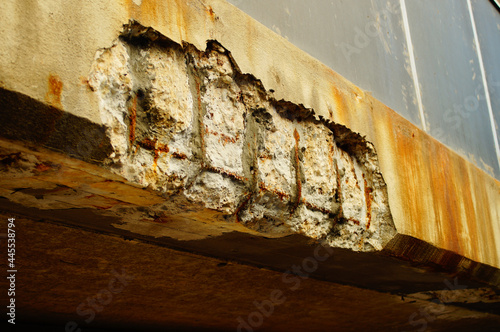 Canvas Print Corrosion damage on a concrete bridge.