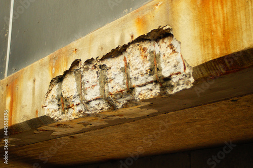 Canvas Print Corrosion damage on a concrete bridge.