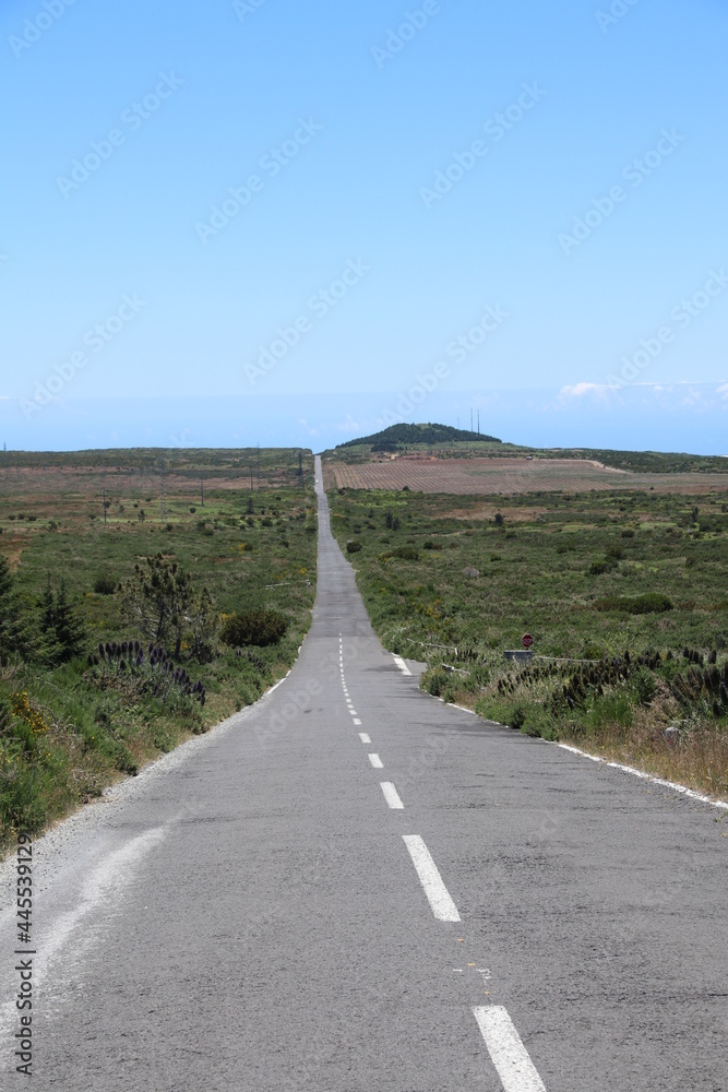 the long empty road on the plateau.