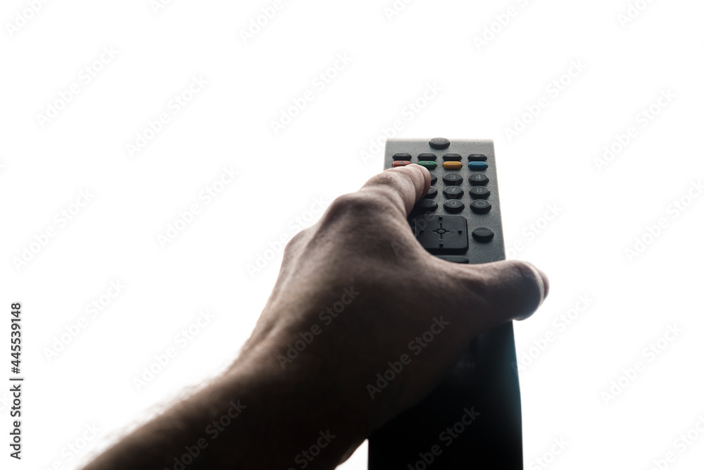 Hand holding tv remote isolated on white background. Hand holding tv remote isolated on white background.