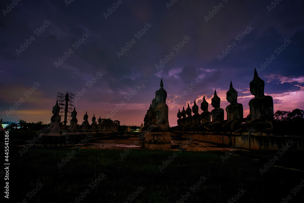 Many Statue buddha image with thunder at night in southen of Thailand Many Statue buddha image with thunder at night in southen of Thailand