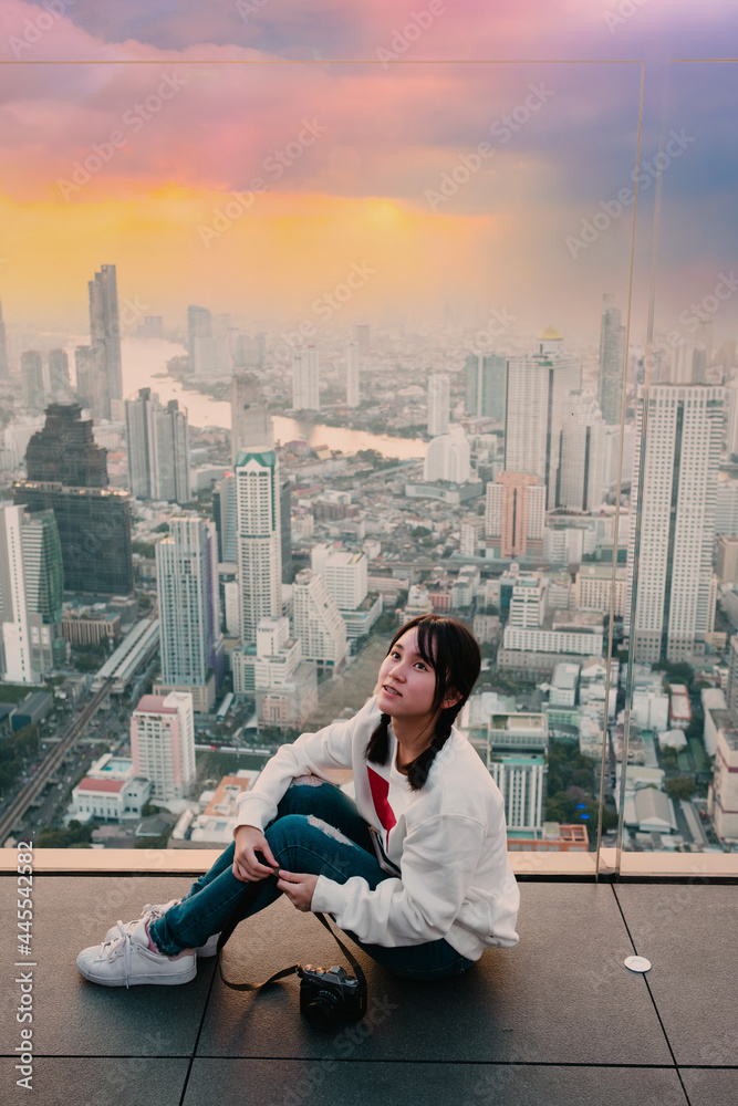 Happy teenager girl using a smart phone in a city, Happy teenager girl using a smart phone in a city,