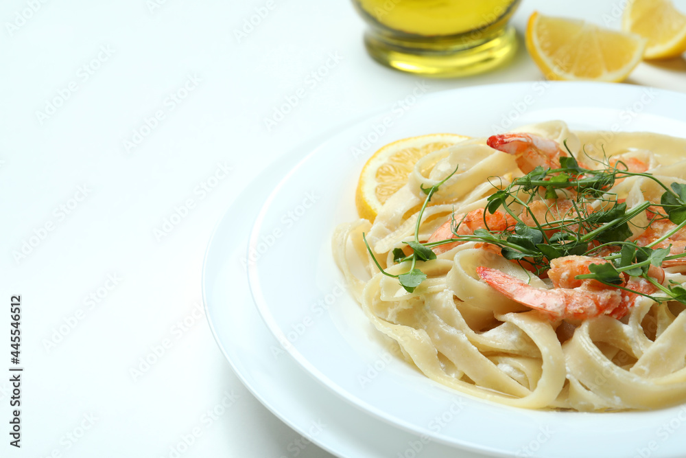 Concept of tasty eating with shrimp pasta on white background