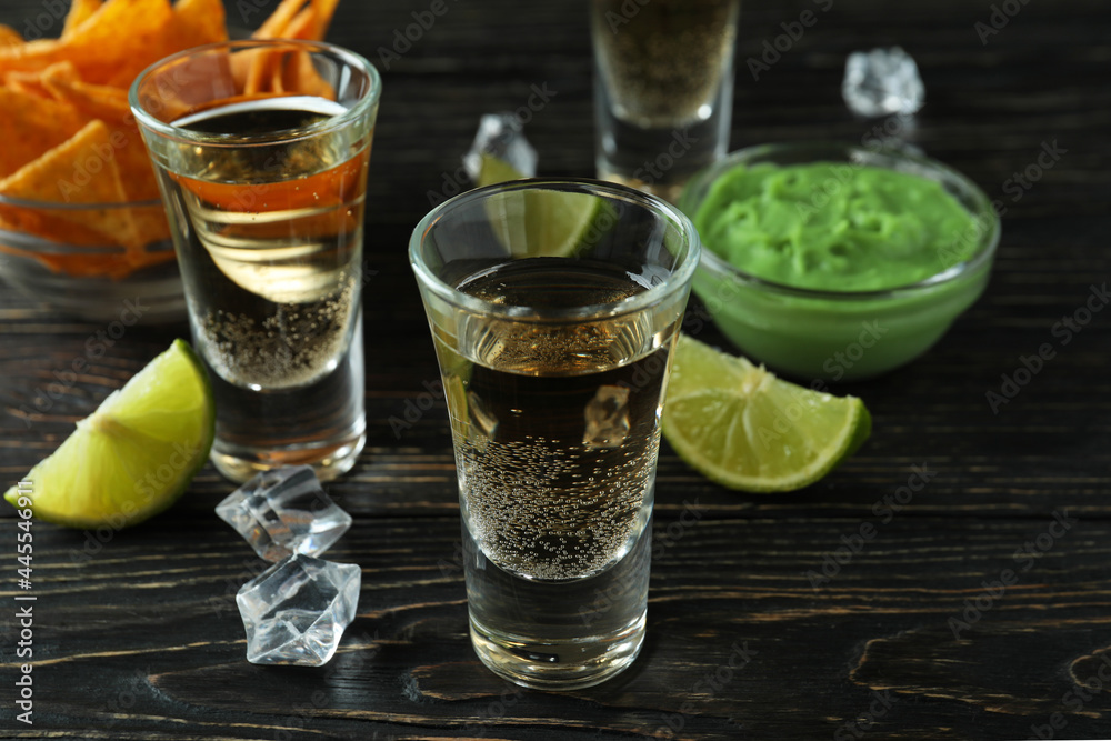 Party concept with tequila, guacamole and chips Party concept with tequila, guacamole and chips