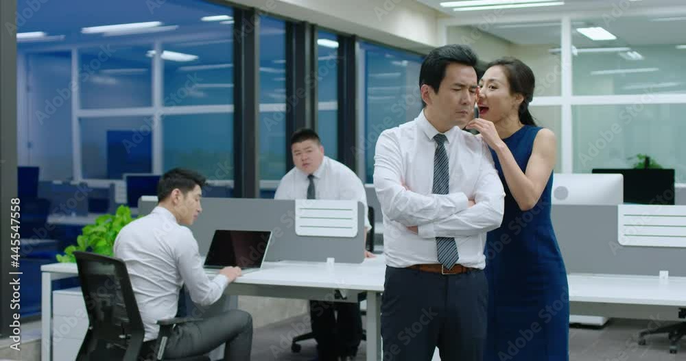 Young businesswoman telling secret to manager,4K Young businesswoman telling secret to manager,4K