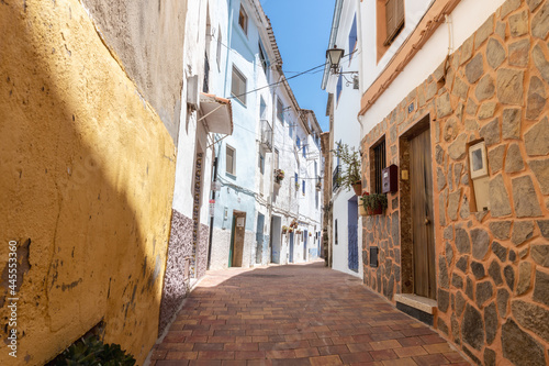Narrow streets of Chelva, picturesque and brightly painted houses, on a sunny...