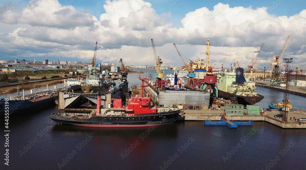 Aerial view of Shipyard. Ships is under constructions.