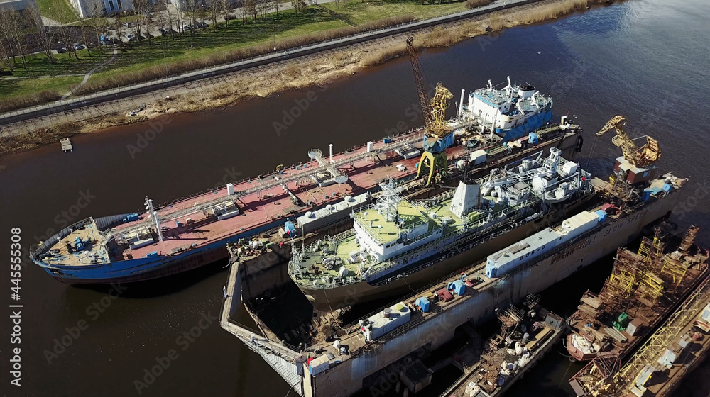 Aerial view of Shipyard. Ships is under constructions.