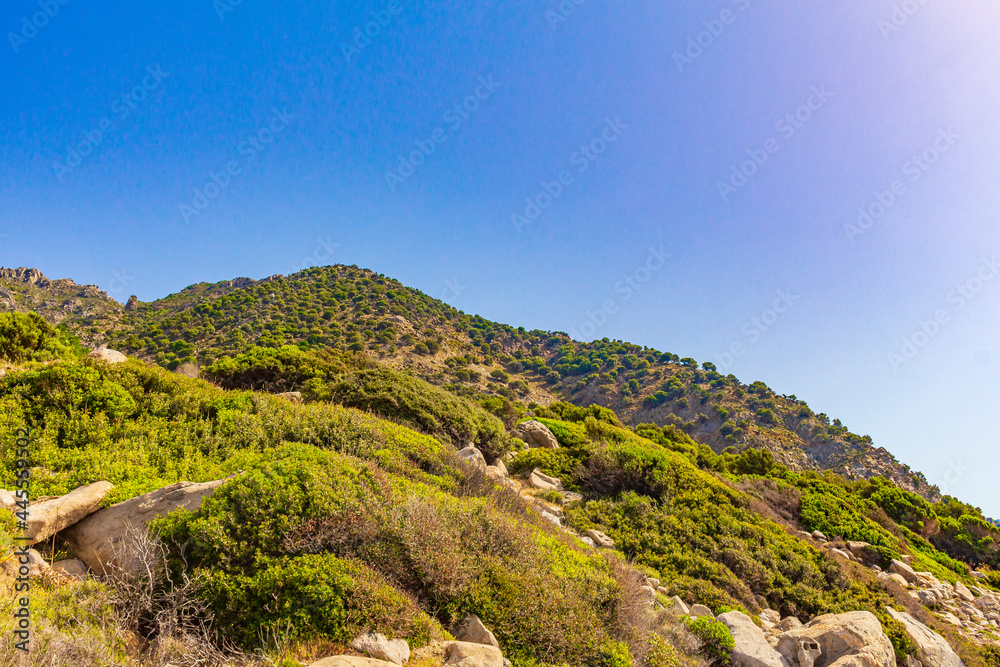 Natural coastal landscapes on Kos Island Greece mountains cliffs rocks.