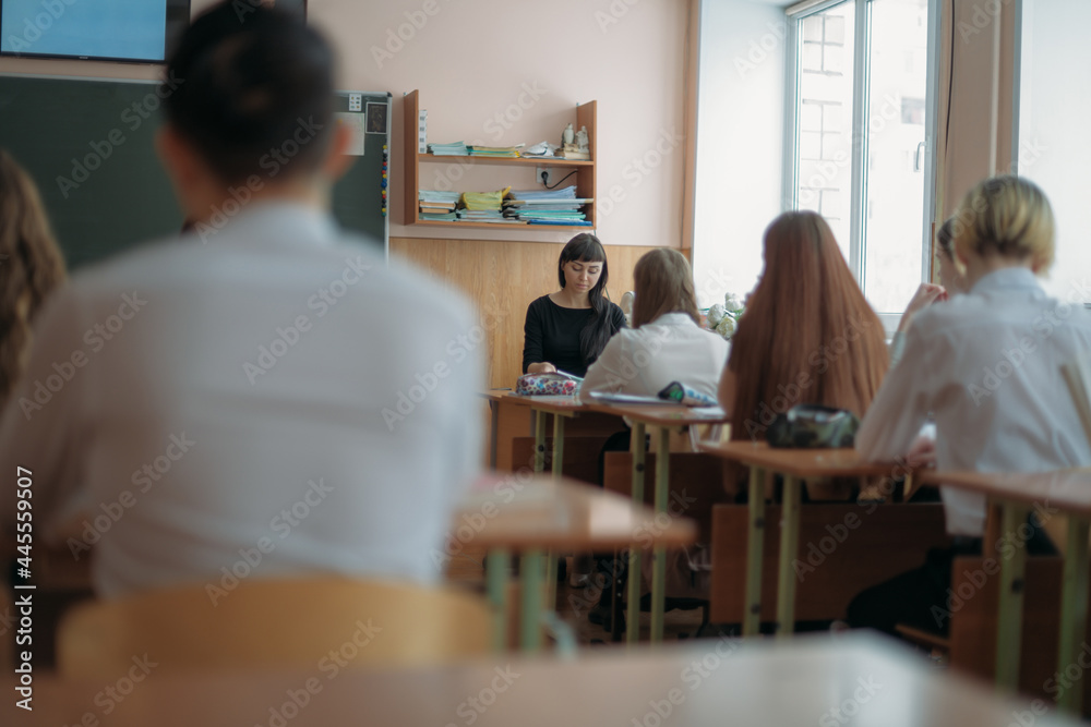 The teacher is teaching a lesson at school. The teacher is teaching a lesson at school.