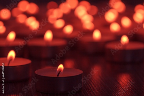 beautiful burning candle  bokeh of burning candles. candle background fire dark flame   isolated.