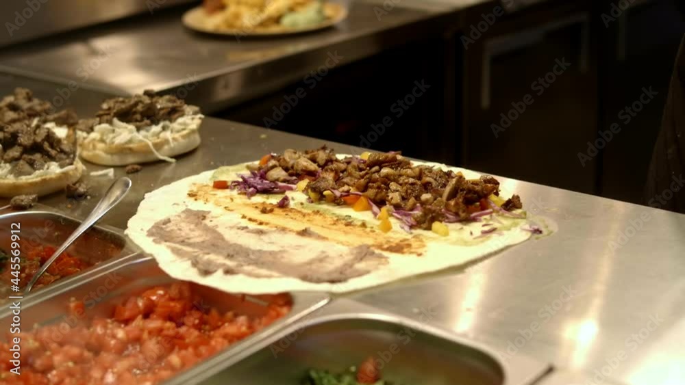 Mexican food. Process of making Mexican quesadillas with cheese and vegetables. Mexican cuisine.
Mexican food. Process of making Mexican quesadillas with cheese and vegetables. Mexican cuisine.