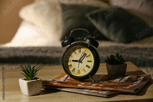 Alarm clock with magazines ...