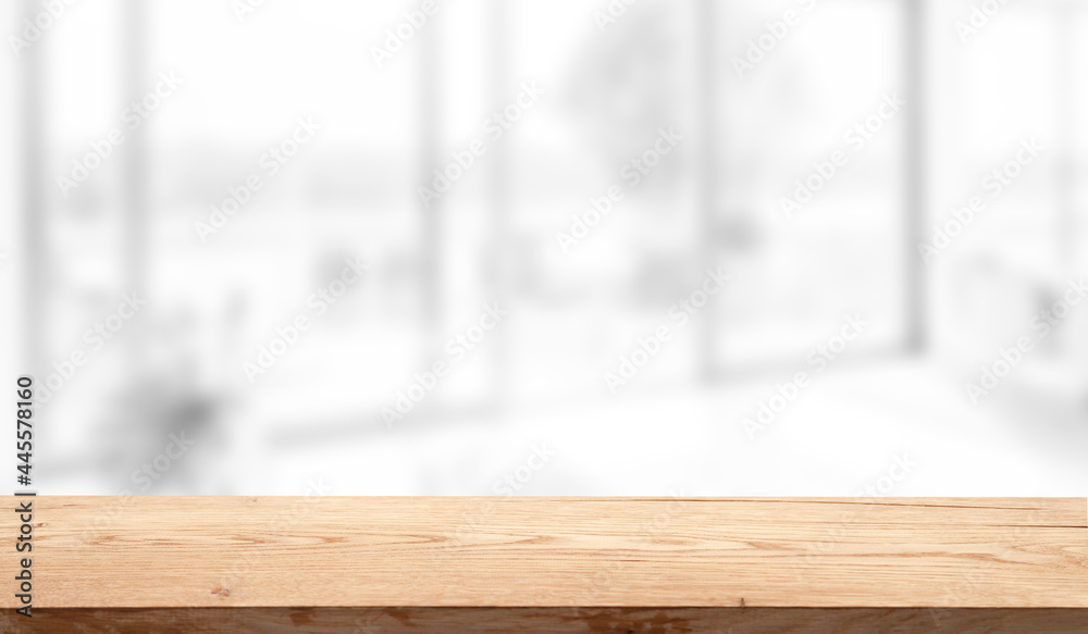 empty wooden light table on the background of abstract blur white interior, montage, product display, inside and window. empty wooden light table on the background of abstract blur white interior, montage, product display, inside and window.