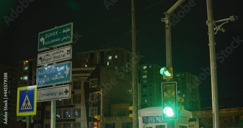 City Direction Sign at Iskan Street Near The Citadel in Erbil, Iraq photo