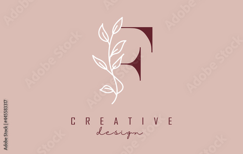 Red F letter logo design with white leaves branch vector illustration.