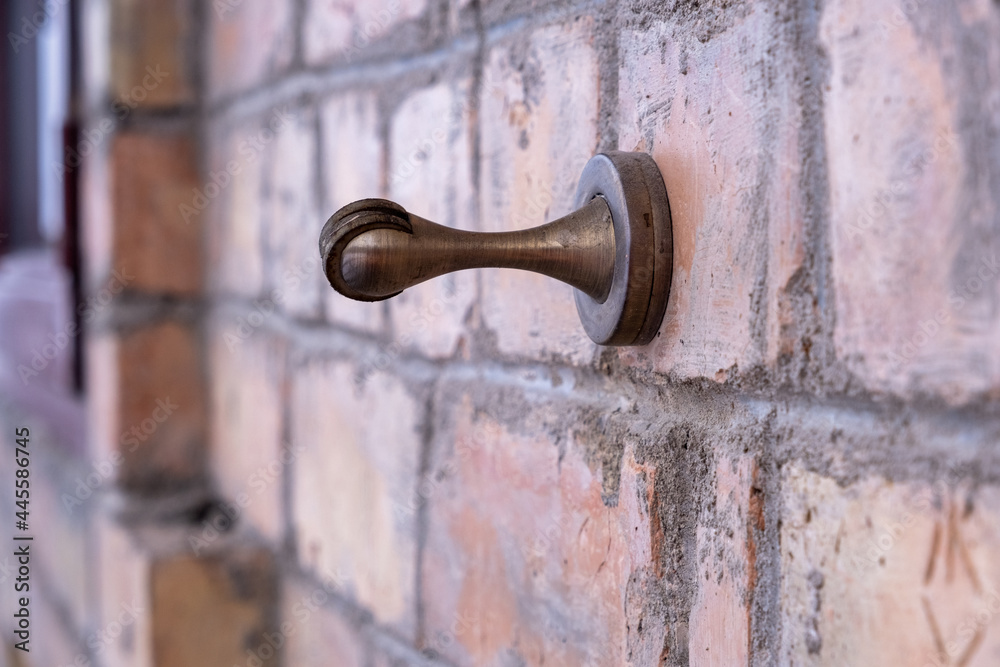 hanger on a brick wall