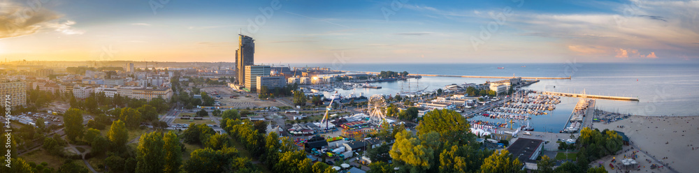 Aerial panorama of the harbor in Gdynia with modern architecture at sunset. Poland