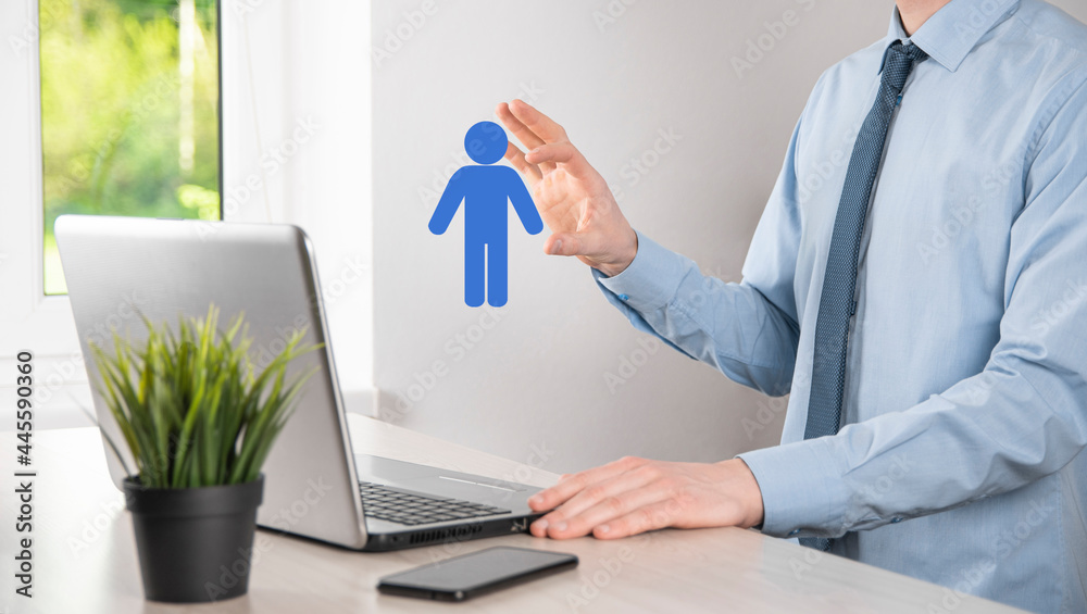 Businessman holds man person icon on dark tone background.HR Human ,people iconTechnology Process System Business with Recruitment, Hiring, Team Building. Organisation structure concept Businessman holds man person icon on dark tone background.HR Human ,people iconTechnology Process System Business with Recruitment, Hiring, Team Building. Organisation structure concept