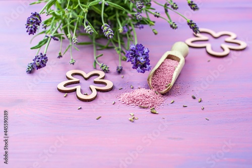 bouquet of fresh lavender flowers and pink salt basket photo